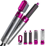Professional 5 in 1 hair dryer brush with multiple styling attachments including curling barrels, brush heads, and concentrator nozzle.